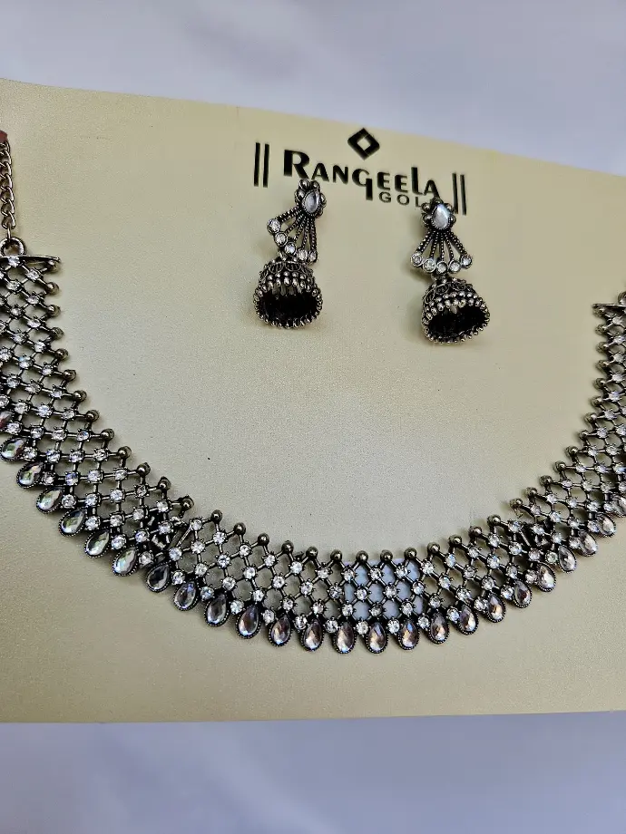 Fancy Black Metal Silver Stone Necklace Set 