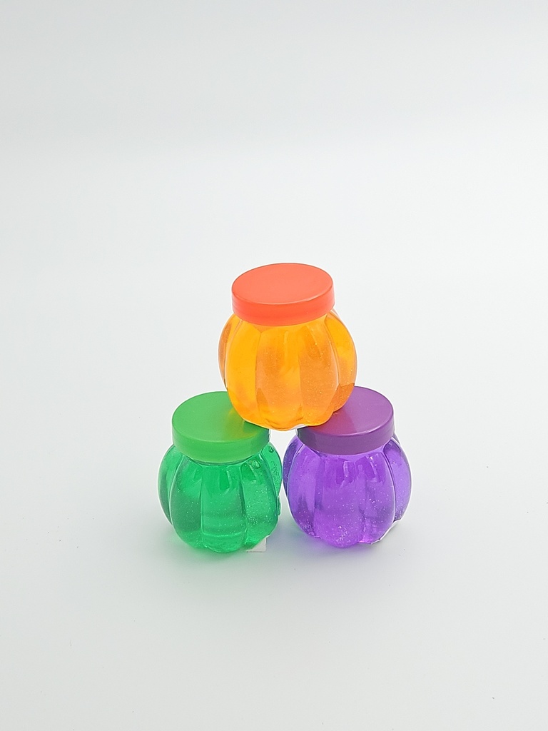Kids Playing Glittered Slime In Pumpkin Shaped Jars