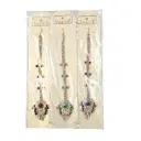 Swastik Light Golden Hanging Chutty With Side Stones